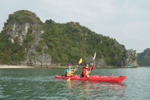 Paddling in Sync at Halong Bay